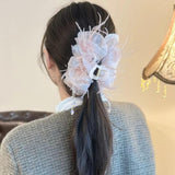 Haute Aesthetic Feather Tassel Claw Clip