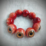 "Ember's Vision" Resin Eyeball Beaded Bracelet